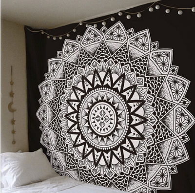 Black and white mandala tapestry with intricate geometric patterns hanging above a bed in a bedroom. - Image 7