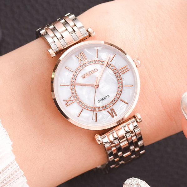 Reloj de Cuarzo con Cristal de Oro