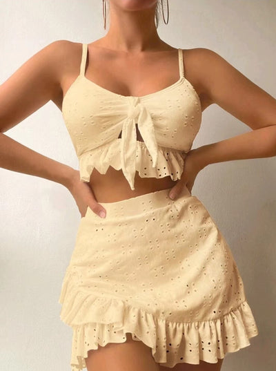 Light blue eyelet two-piece swimsuit set with a tie-front crop top and a matching ruffle-trim hip-hugging skirt. - Image 20