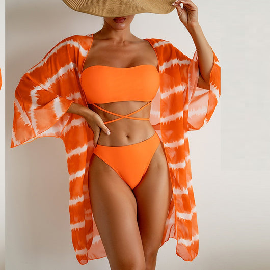 Women's orange and white tie-dye chiffon three-piece swimsuit with a bandeau bikini top and matching bottoms. - Image 2