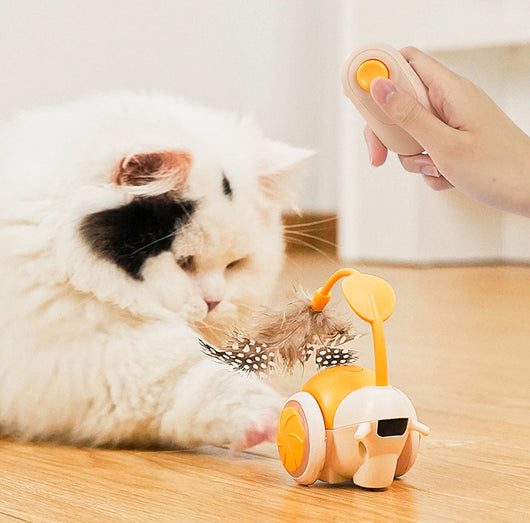 White and black electric cat teaser toy with blue accents and a flexible arm, shown with a white remote control. - Image 17