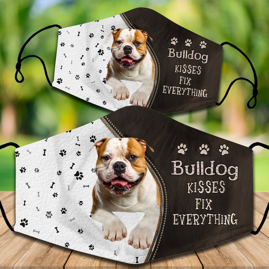 Two cotton face masks with a Bichon Frise dog, paw prints, and bones on a white and brown background. Text reads "Bichon Frise KISSES FIX EVERYTHING." - Image 19