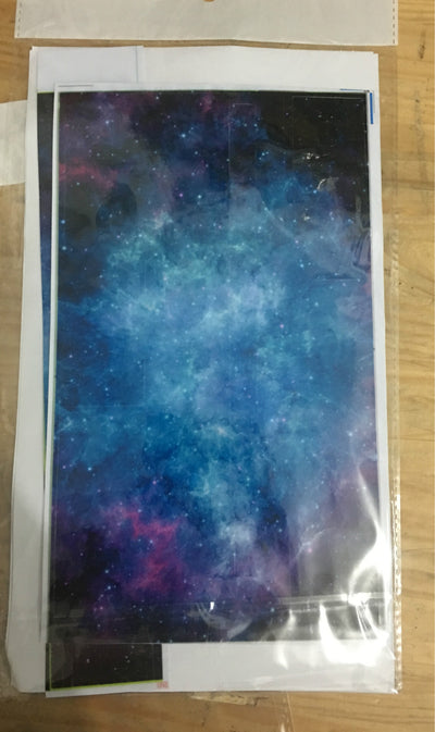 Xbox One film skin sticker with a vibrant blue and purple galaxy pattern, packaged in a clear bag. - Image 9