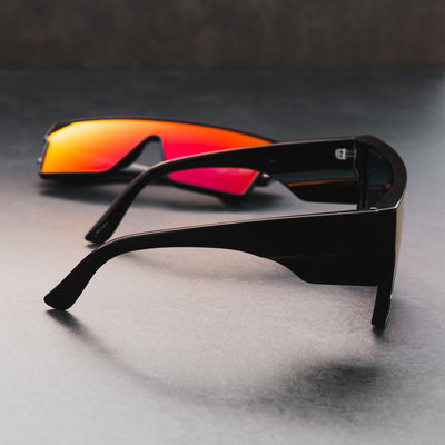 Black frame sports cycling sunglasses with vibrant purple polarized shield lenses, ideal for biking and outdoor activities. - Image 25