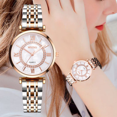 Reloj de Cuarzo con Cristal de Oro