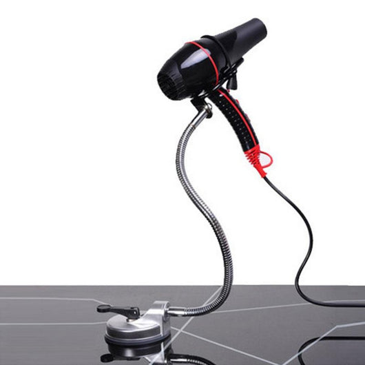 Hands-free hair dryer holder with a flexible silver gooseneck arm and a black suction cup base, holding a black hair dryer. - Image 7