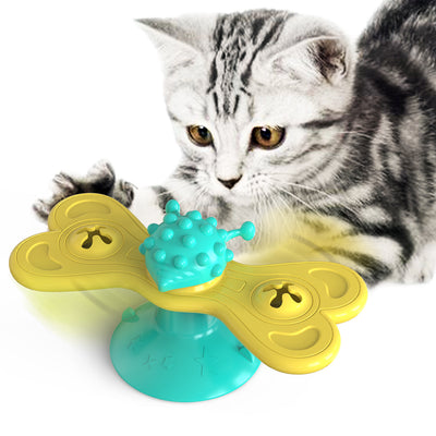 Green and yellow butterfly cat turntable toy with a textured ball, designed as a bite toy for cats. - Image 11