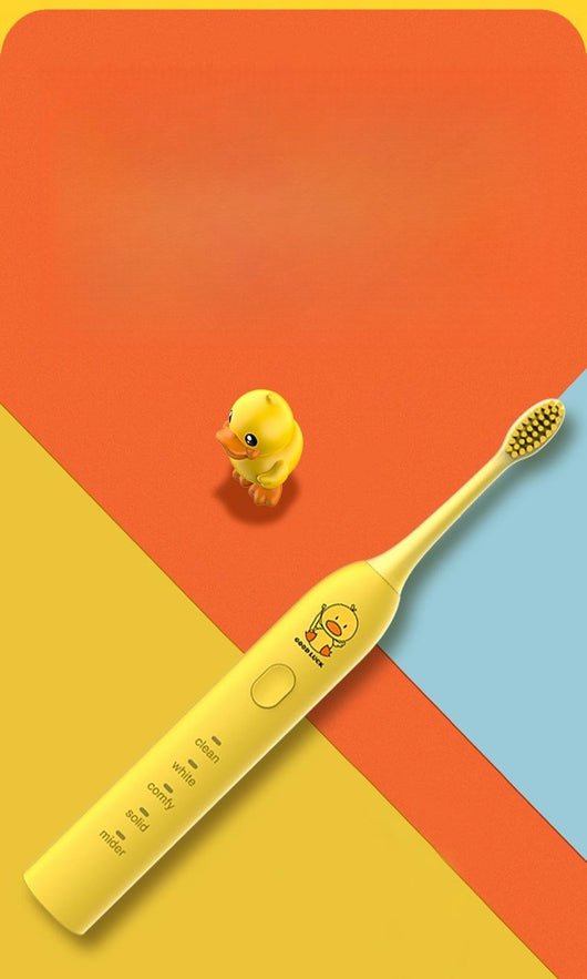 Light blue electric toothbrush with four soft bristle brush heads and a decorative box with teal leaf pattern. - Image 8