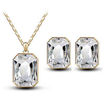 Teal rectangular crystal necklace and matching stud earrings set with silver-toned settings and chain. - Image 3