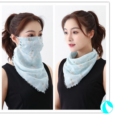 White women's UV protection scarf with black speckle pattern, worn as a face mask and neck scarf. - Image 19