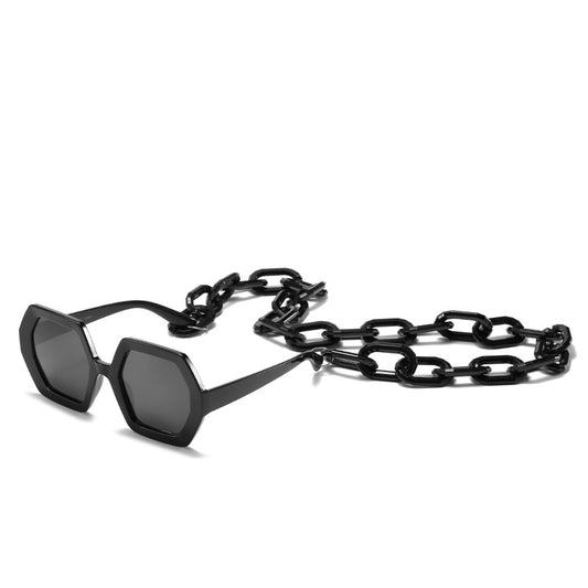 Octagonal sunglasses with brown gradient lenses and a tortoiseshell chain strap on a white background. - Image 2
