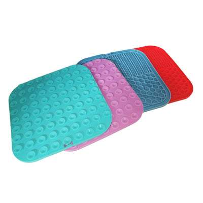 Gray silicone pet licking pad with four textured sections, designed for slow feeding and anti-choking. - Image 38