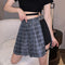 Falda Irregular con Cadenas Decorativas