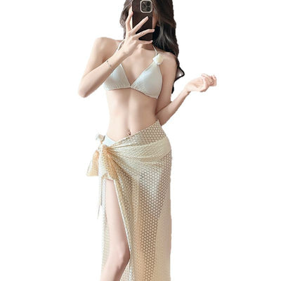 Women's light purple three-piece bikini set with a triangle halter top, bottoms, and a mesh sarong with rose details. - Image 5
