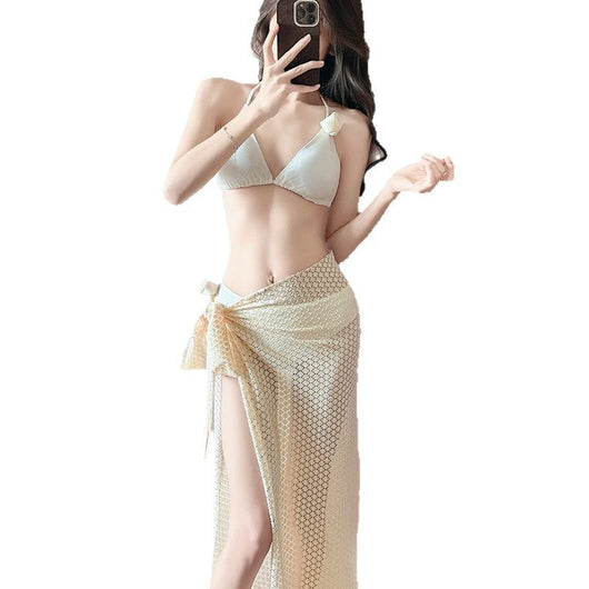 Women's light purple three-piece bikini set with a triangle halter top, bottoms, and a mesh sarong with rose details. - Image 5