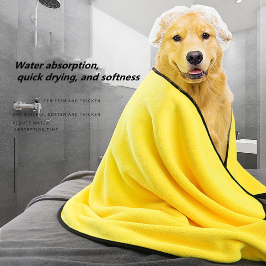 Yellow microfiber pet drying towel with black trim draped over a bathtub, with a golden retriever, poodle, and cat.