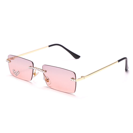 Frameless rectangular sunglasses with pink gradient lenses, gold-tone metal arms, and rhinestone embellishments. - Image 10