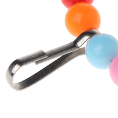 Colorful wooden bird swing with an arched top made of rainbow beads, a natural wood perch, and two small bells. - Image 9