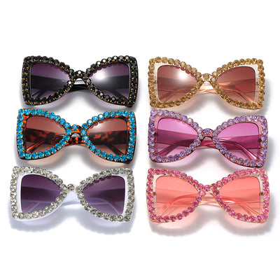 Pink butterfly frame sunglasses with purple gradient lenses and sparkling purple rhinestone embellishments. - Image 13