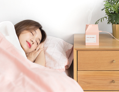 Pink milk carton shaped humidifier with a white label, featuring "Milkbox Humidifier" text and a bcase logo. - Image 16