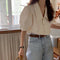 Blusa Elegante con Escote en V y Mangas Abullonadas