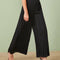 Pantalones Anchos con Pliegues