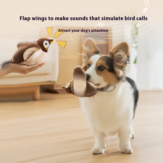 Plush interactive bird toy with brown head, cream body, yellow beak, and spotted feather tail.