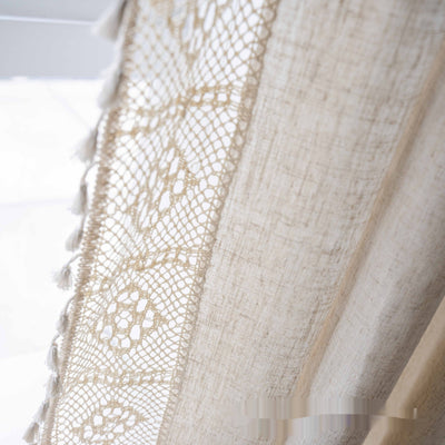 Close-up of a beige semi-transparent curtain with a delicate crochet lace trim and decorative tassels. - Image 12