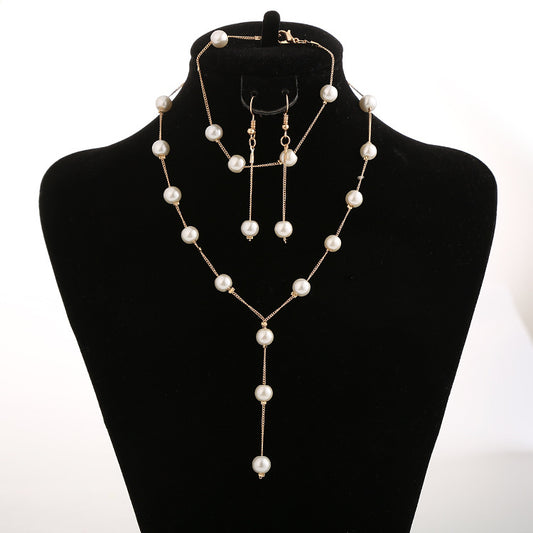 Conjunto de Joyería Perla Elegante: Collar, Aretes y Pulsera