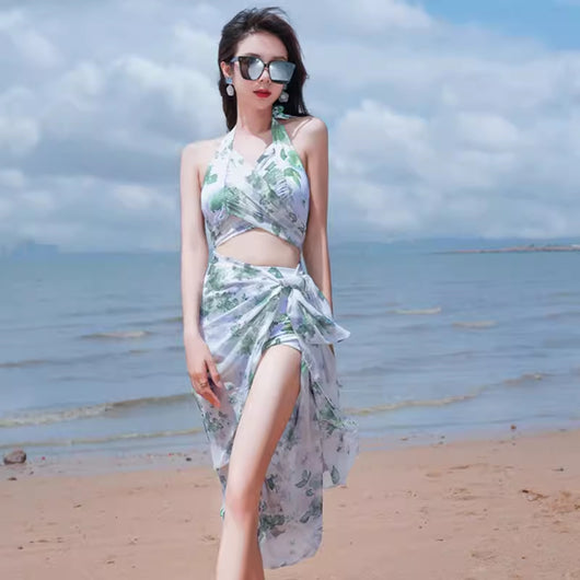 Women's light blue tropical leaf print three-piece swimsuit with short sleeve bikini top, bottoms, and sarong skirt. - Image 37