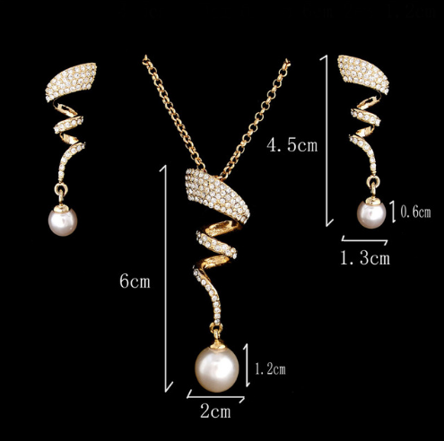 Gold-toned heart-shaped necklace and dangle earrings set with clear rhinestones and faux pearls. - Image 9