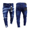 Pantalones vaqueros rotos con diseño pintado
