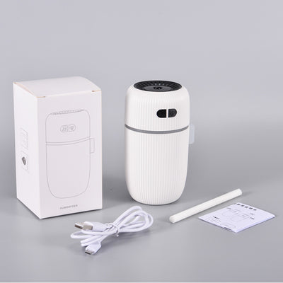 Black ribbed white noise humidifier with control buttons on top, designed to aid sleep and humidify. - Image 2