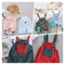 Conjunto Infantil Dos Piezas con Babero - Playera Cuello Redondo Manga Corta