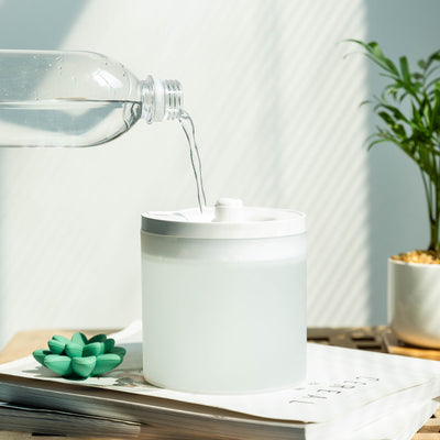 White cylindrical ultrasonic humidifier with a pink lotus flower on top, powered by USB for aromatherapy. - Image 3