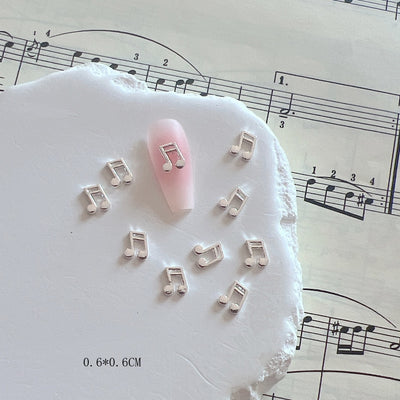 Accesorios de Uñas Metálicos con Símbolos Musicales - Image 5