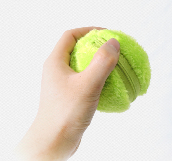 Black electric pet toy ball with four colorful plush covers in blue, pink, green, and yellow.