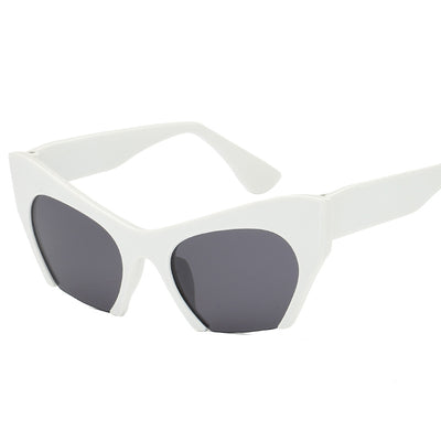 Red cat-eye sunglasses with silver mirrored lenses, featuring a bold retro frame design. - Image 16