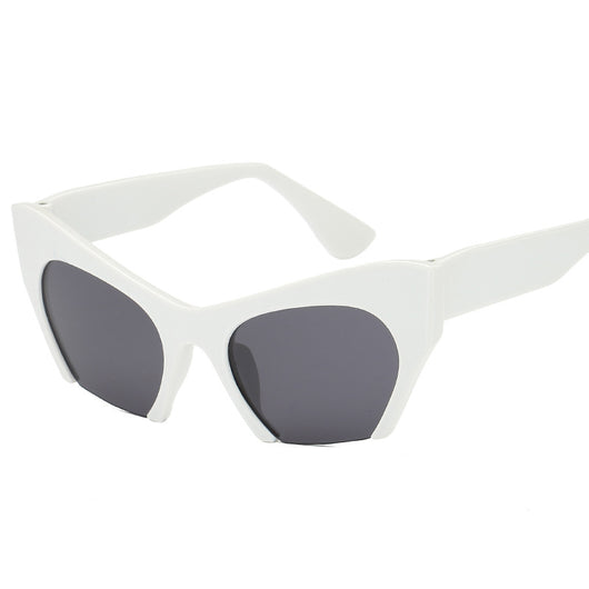 Red cat-eye sunglasses with silver mirrored lenses, featuring a bold retro frame design. - Image 16