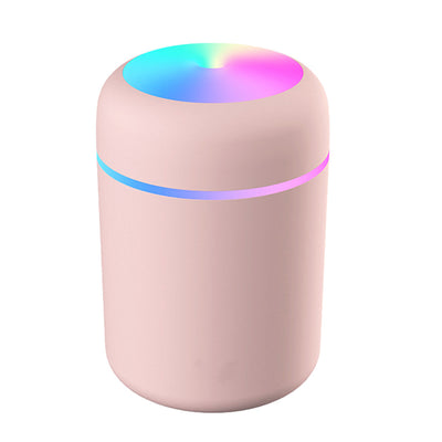 Dark gray ultrasonic aromatherapy essential oil diffuser with a colorful LED light band and rainbow top light. - Image 8