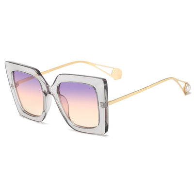 Women's black square frame sunglasses with blue gradient lenses and gold metal temples featuring a pearl accent. - Image 6