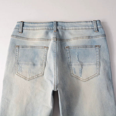 Jeans Azul Cielo Desgastado con Roturas Vintage para Hombre - Image 17