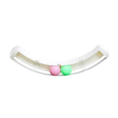 White curved track cat toy with green and pink balls, mounted on a blue wall, with two cats playing. - Image 4