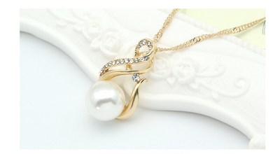 Gold-tone necklace and matching earrings set with white faux pearls and clear rhinestones, ideal for bridal or dinner wear. - Image 12