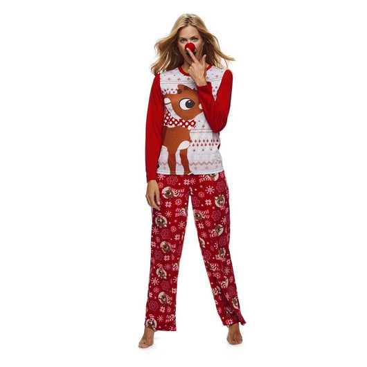 Family of five wearing matching red and white Christmas pajamas with reindeer and snowflake patterns. - Image 6