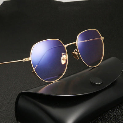 Silver metal anti-blue light glasses with rounded hexagonal clear lenses and black temple tips on a white background. - Image 4