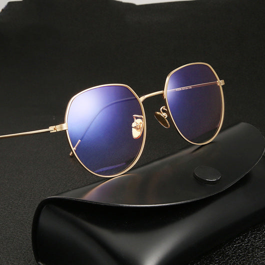 Silver metal anti-blue light glasses with rounded hexagonal clear lenses and black temple tips on a white background. - Image 4