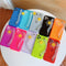 Funda para celular con cadena Smiley