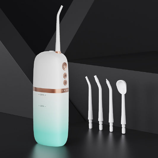 White and rose gold portable electric water flosser with a curved nozzle and volume markings for 160ml and 200ml.