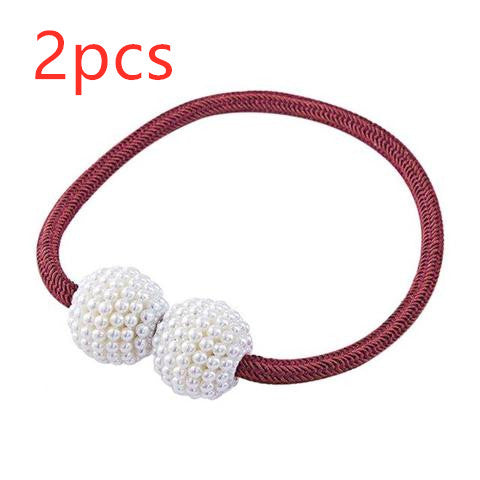 Magenta elastic curtain tieback with two white pearl-beaded spheres, designed to hold curtains elegantly. - Image 26